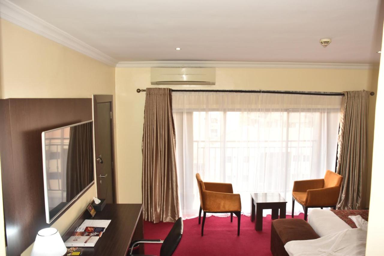 Best Western Plus Elomaz Hotel Asaba Buitenkant foto